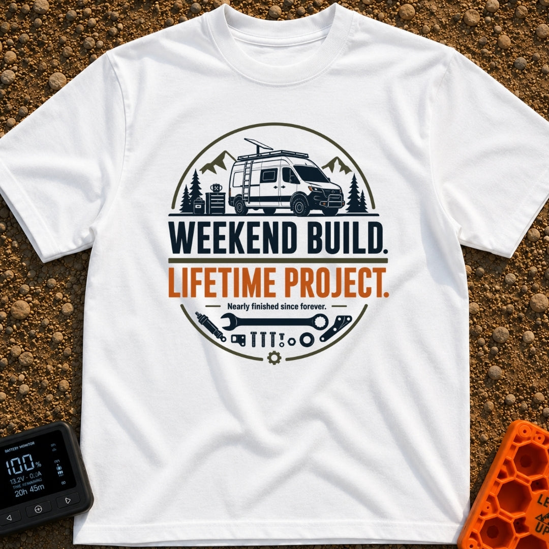 Lifetime Weekend Build - T-Shirt in White - A circular graphic showing a white camper van parked near pine trees and...