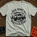 Wags On Wheels - T-Shirt in Bay - A black and white circular illustration of a rugged camper van parked in front of...