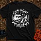 Wags On Wheels - T-Shirt in Black - A black and white circular illustration of a rugged camper van parked in front of...