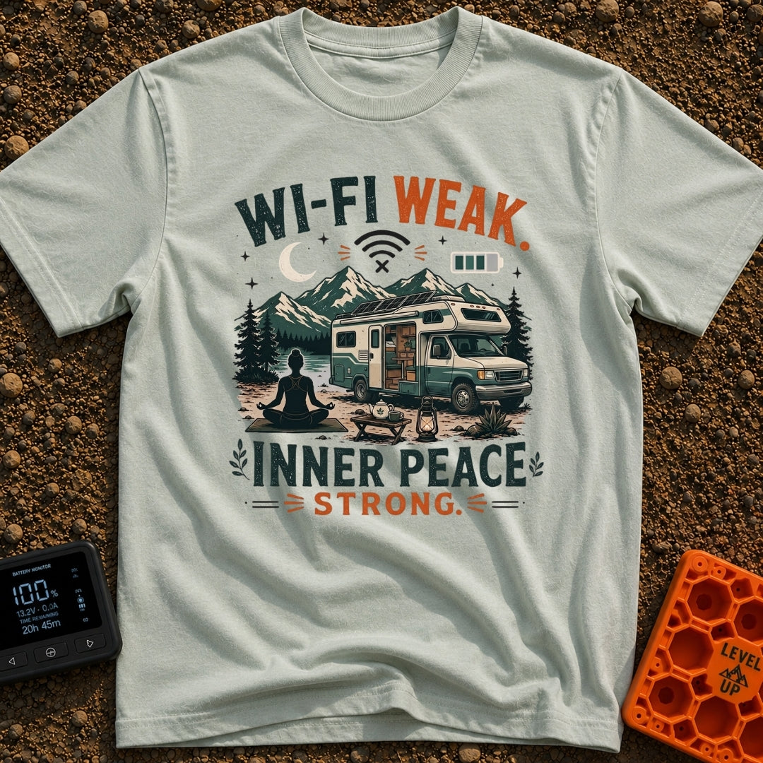 Low Bars High Zen - T-Shirt in Bay - A silhouette of a woman meditating on a mat in front of an RV parked in a mountain...