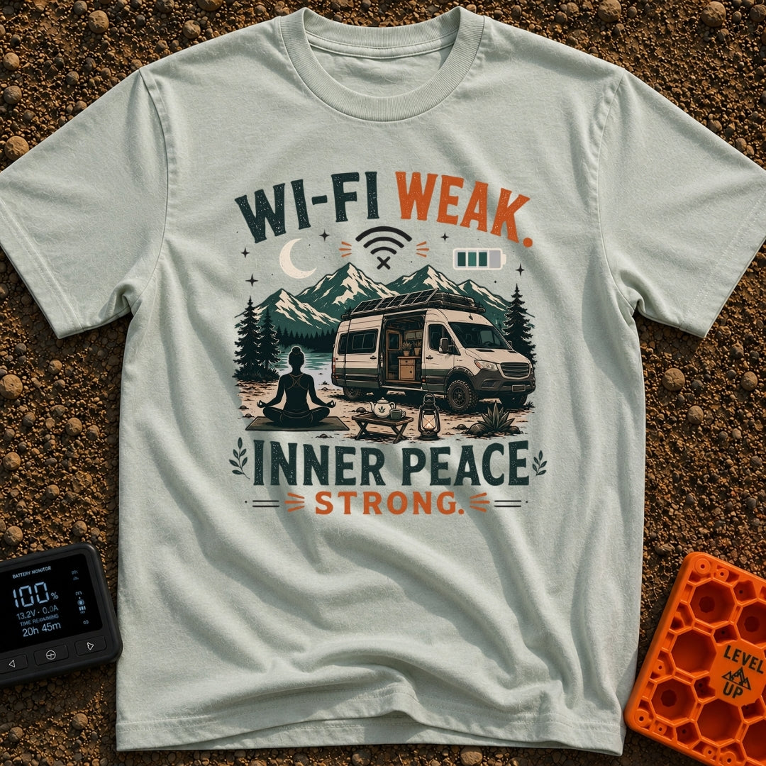 Low Signal High Zen - T-Shirt in Bay - A silhouette of a woman meditating on a mat in front of a camper van with...