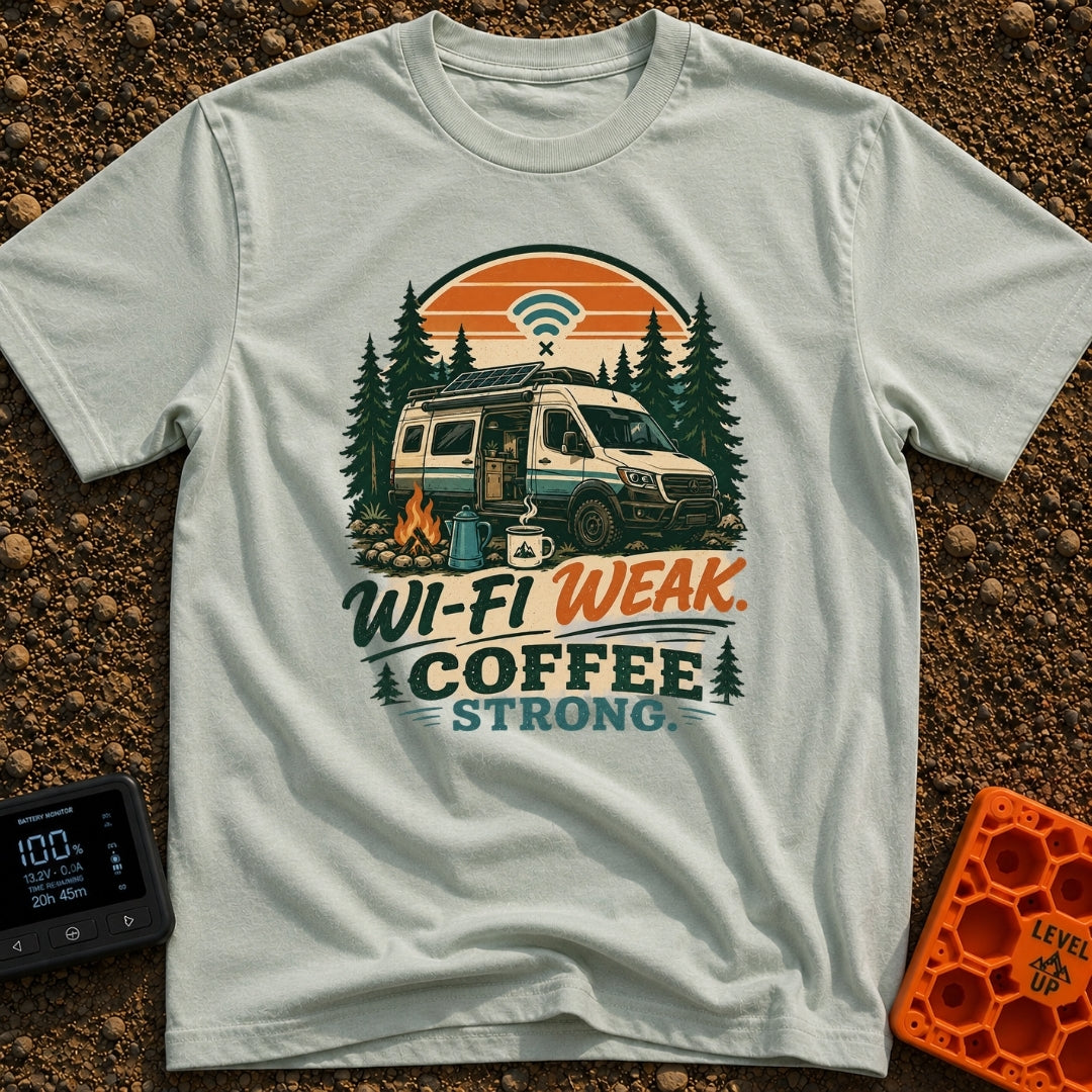 Caffeine Over Connection - T-Shirt in Bay - An illustration of a camper van with a roof-mounted solar panel parked in a...