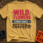 Wild Wired And Brewed - T-Shirt in Mustard - A stacked typographic design featuring the words "WILD FLOWERS" in red with...