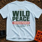 Wild and Wired - T-Shirt in Chambray - A typographic design featuring the words "WILD PEACE" in large green text above a...