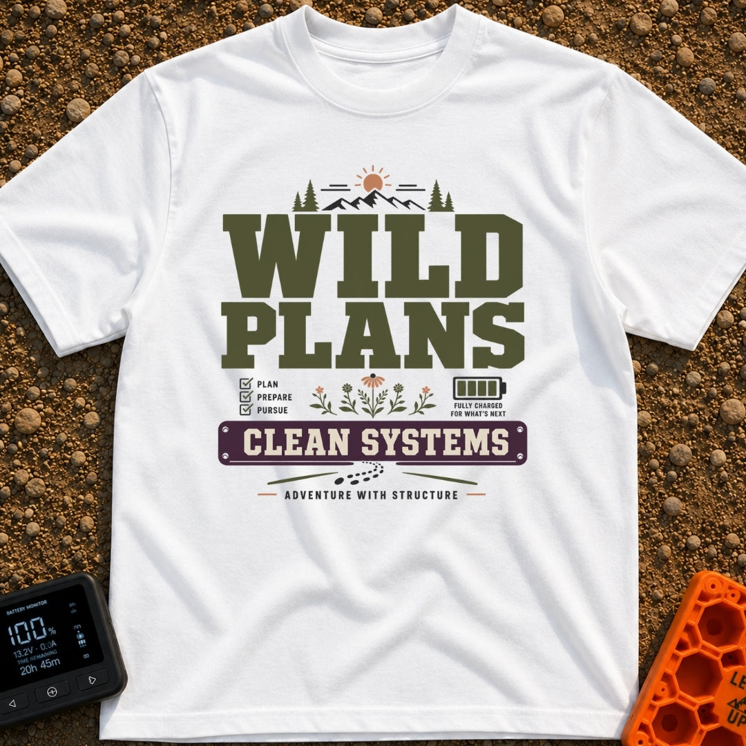 Wild Plans Clean Watts - T-Shirt in White - A typographic design with the text "WILD PLANS" and "CLEAN SYSTEMS" alongside...