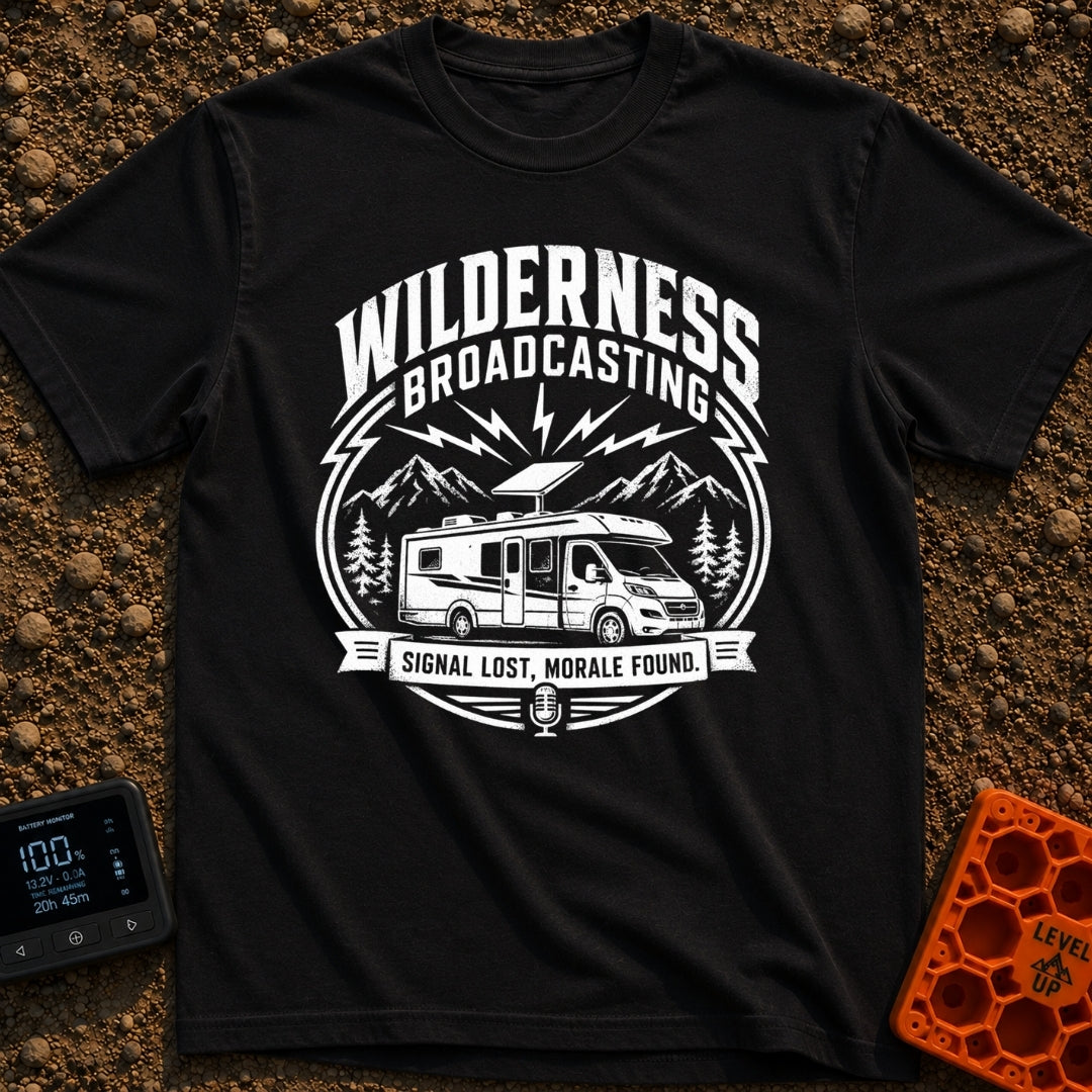 Wilderness Broadcasting System - T-Shirt in Black - A black and white circular emblem illustration showing a Class C...