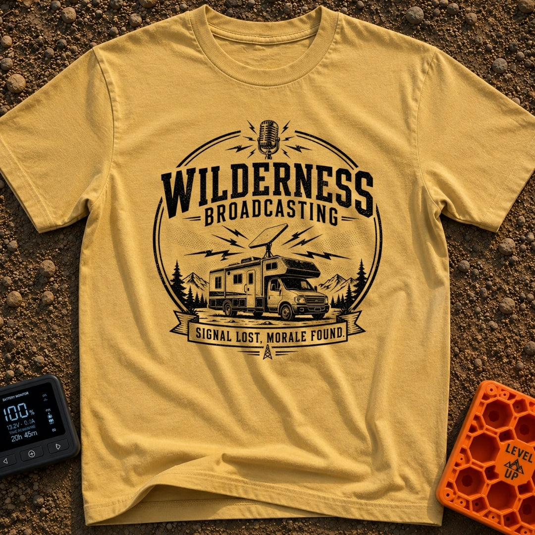 Wilderness Broadcasting System - T-Shirt in Mustard - A black and white circular emblem illustration showing a Class C...