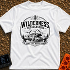 Wilderness Broadcasting System - T-Shirt in White - A black and white circular emblem illustration showing a Class C...