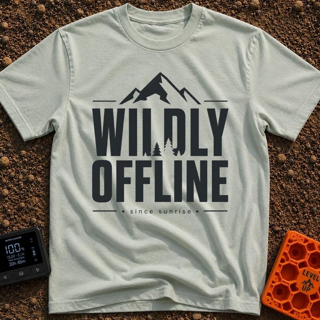 Wildly Off The Grid - T-Shirt in Bay - A typographic design featuring the large bold text "WILDLY OFFLINE" with pine tree...