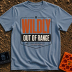 Wildly Out Of Range - T-Shirt in Blue Jean - A typographic badge design featuring the text 'WILDLY OUT OF RANGE' with...