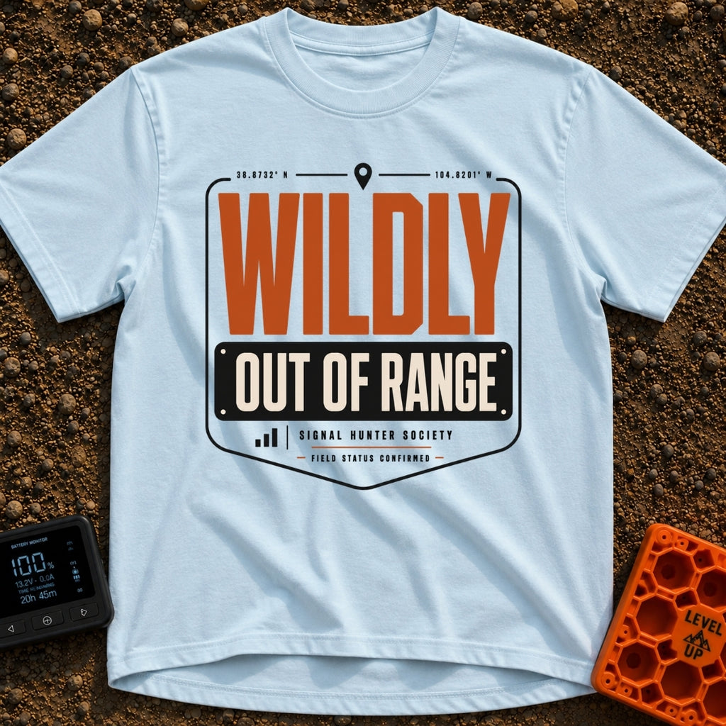 Wildly Out Of Range - T-Shirt in Chambray - A typographic badge design featuring the text 'WILDLY OUT OF RANGE' with...