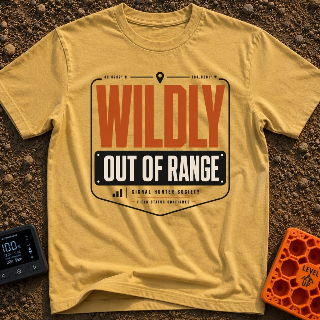 Wildly Out Of Range - T-Shirt in Mustard - A typographic badge design featuring the text 'WILDLY OUT OF RANGE' with...