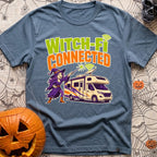 Connected To Witch Fi - T-Shirt in Blue Jean - A cartoon witch with purple hair, a purple dress, and a pointy hat points...