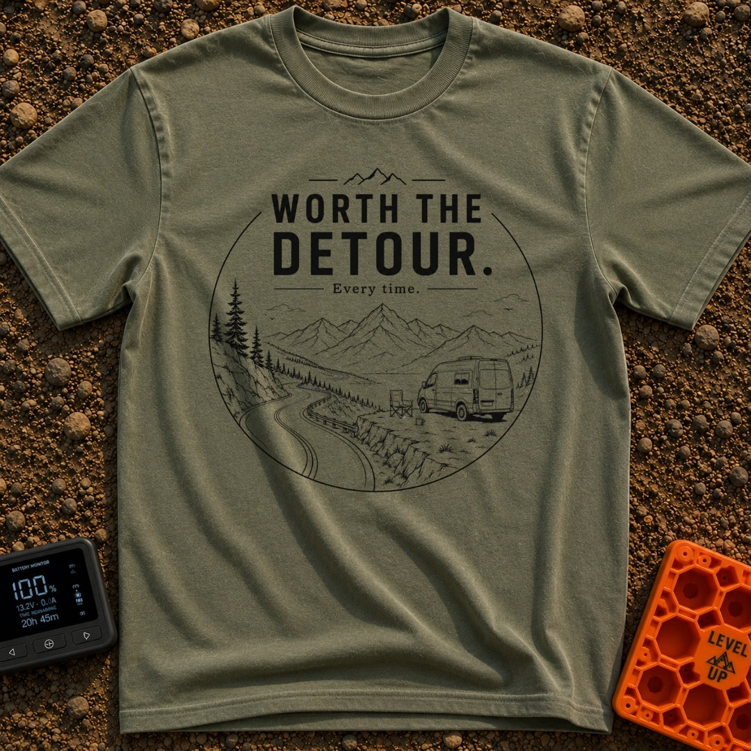 Worth The Detour - T-Shirt in Moss - A black and white line drawing of a camper van parked on a dirt pull-off overlooking...
