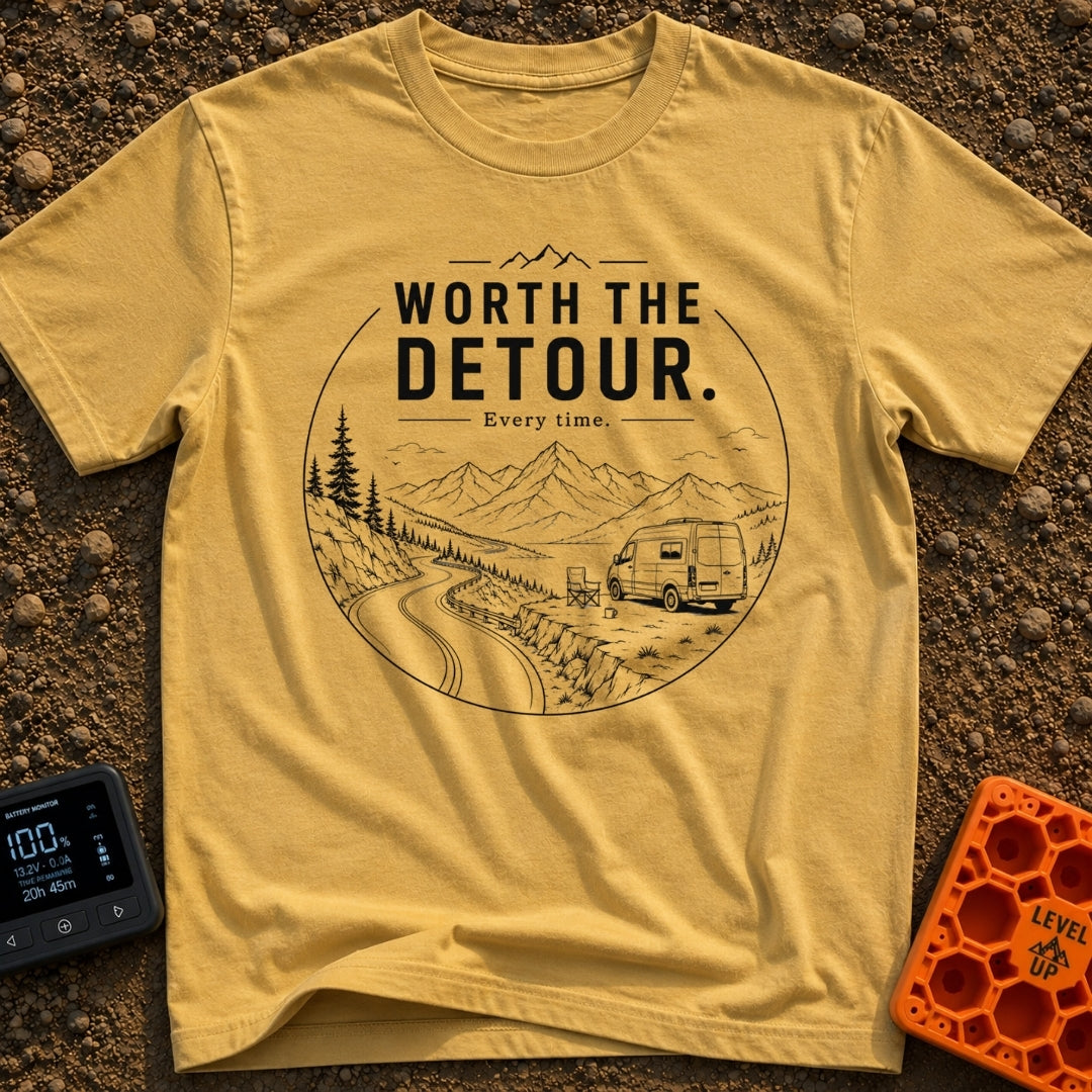 Worth The Detour - T-Shirt in Mustard - A black and white line drawing of a camper van parked on a dirt pull-off...
