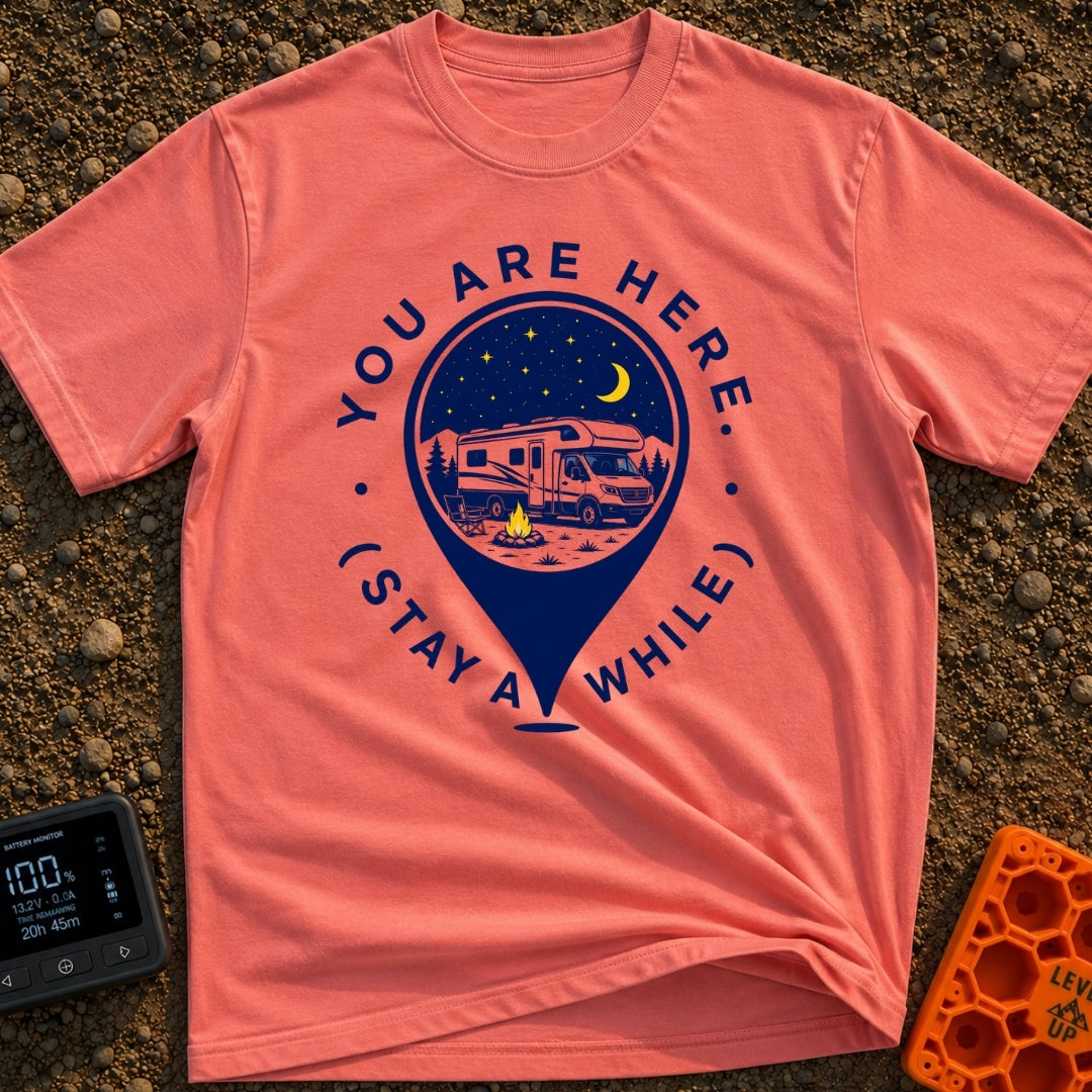 Stay Here A While - T-Shirt in Watermelon - A graphic of a large location map pin containing an illustration of an RV...