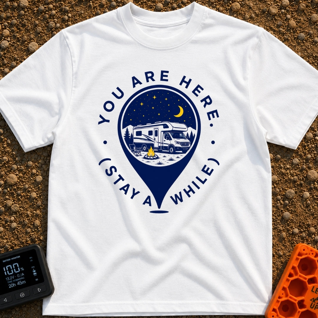 Stay Here A While - T-Shirt in White - A graphic of a large location map pin containing an illustration of an RV parked...