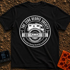 Zero Chill Club - T-Shirt in Black - A circular badge illustration showing the front half of a camper van and a large...