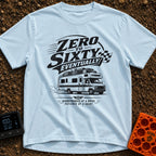 Zero To Sixty Maybe - T-Shirt in Chambray - A black and white illustration of a heavily loaded Class C motorhome driving...