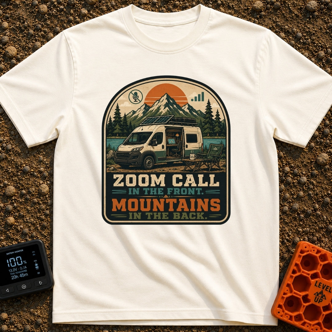 Zoom Front Mountains Back - T-Shirt in Ivory - A camper van with an open side door revealing a mobile office setup with a...